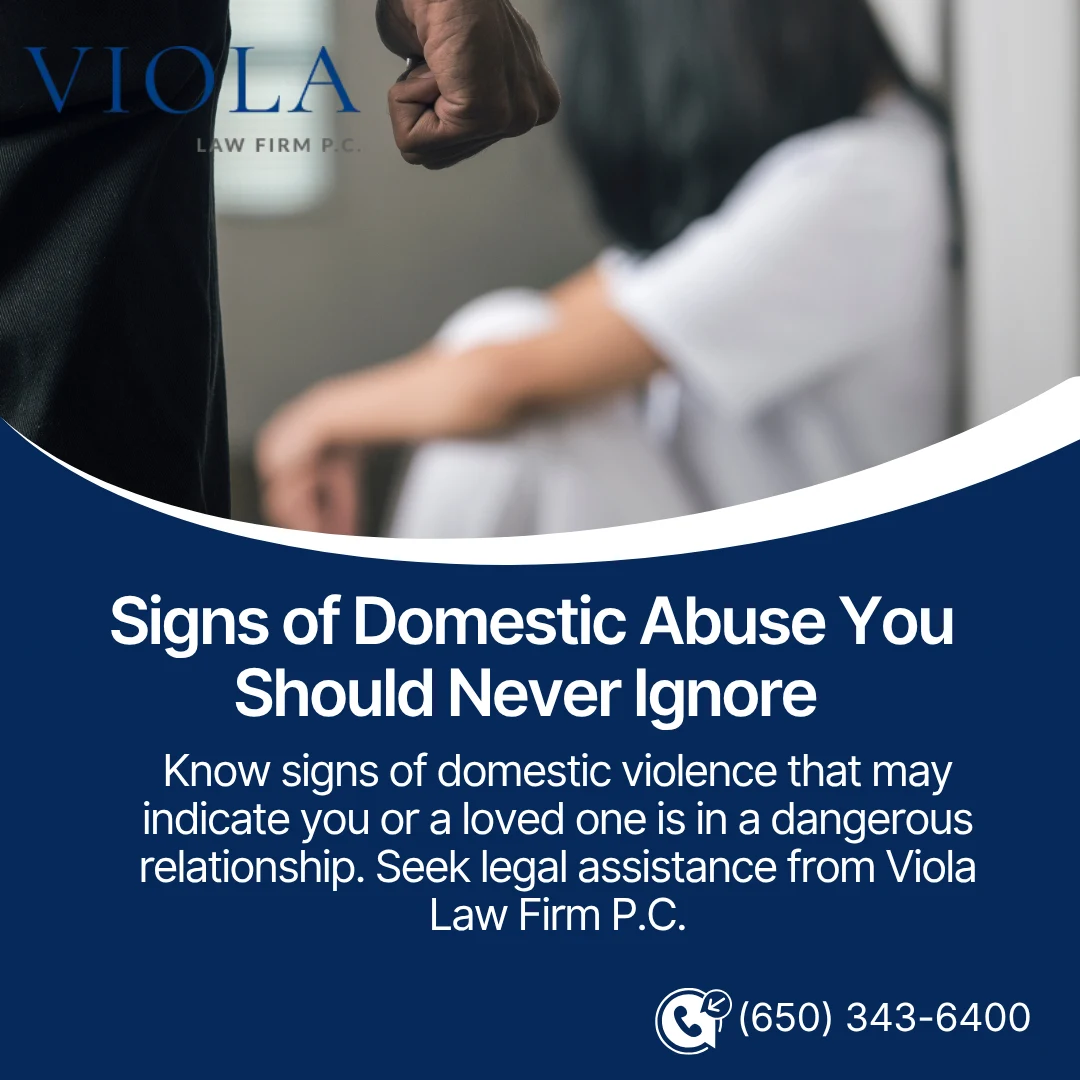 Violent imagery of a clenched fist and a cowering victim, highlighting domestic abuse awareness, featuring Viola Law Firm branding.