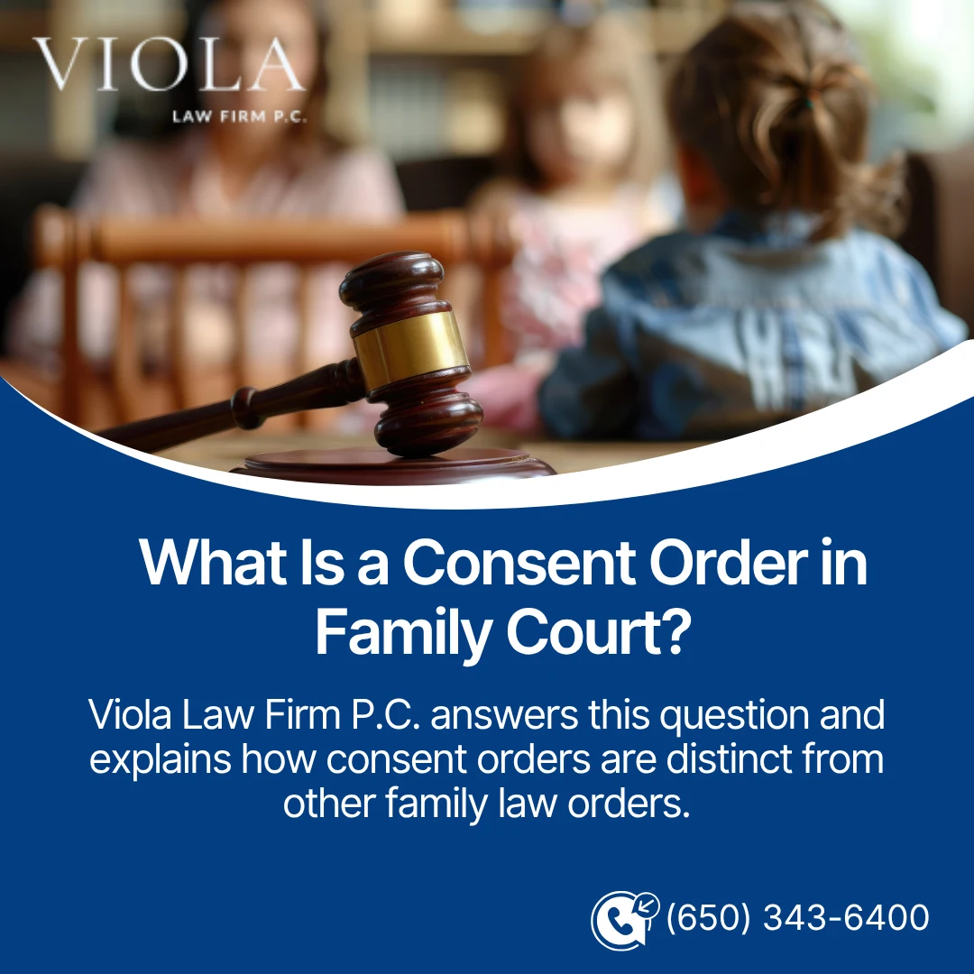 Wooden gavel on a surface with children in the background, promoting an explanation of consent orders by Viola Law Firm.